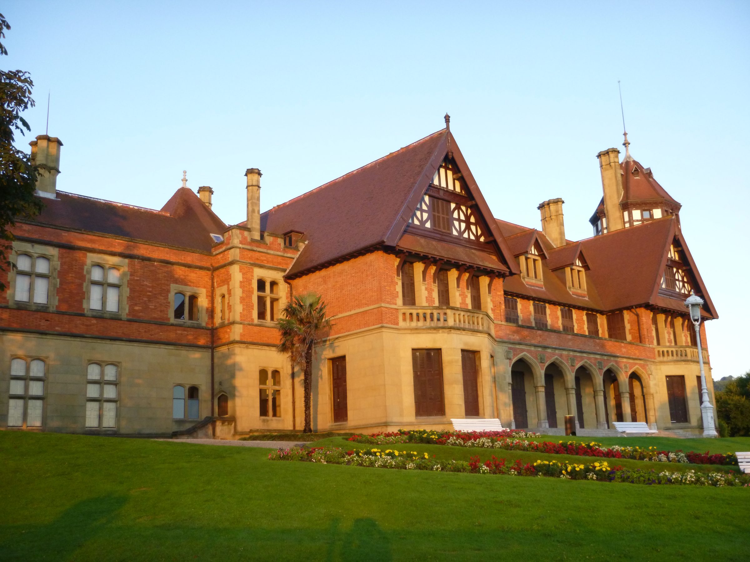 Miramar Palace in San Sebastián in warm evening light.
