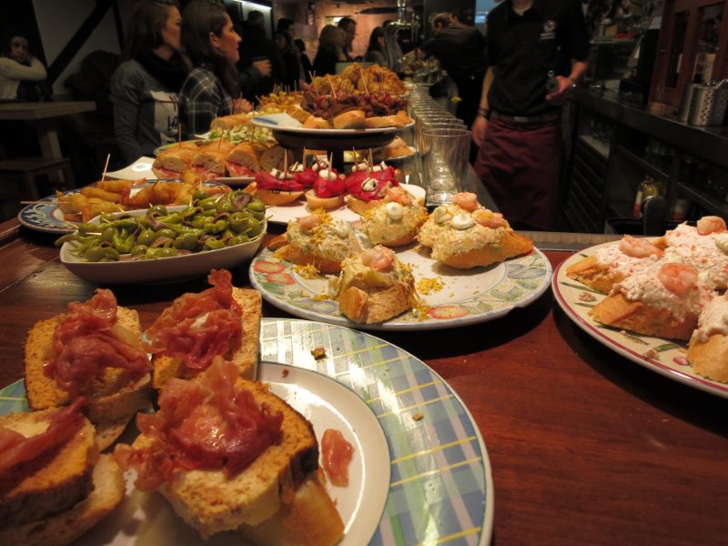 Pintxos laid out on a bar counter in San Sebastián’s old town.